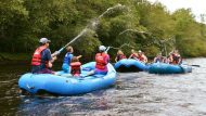 Family water gun fight in poconos rafting